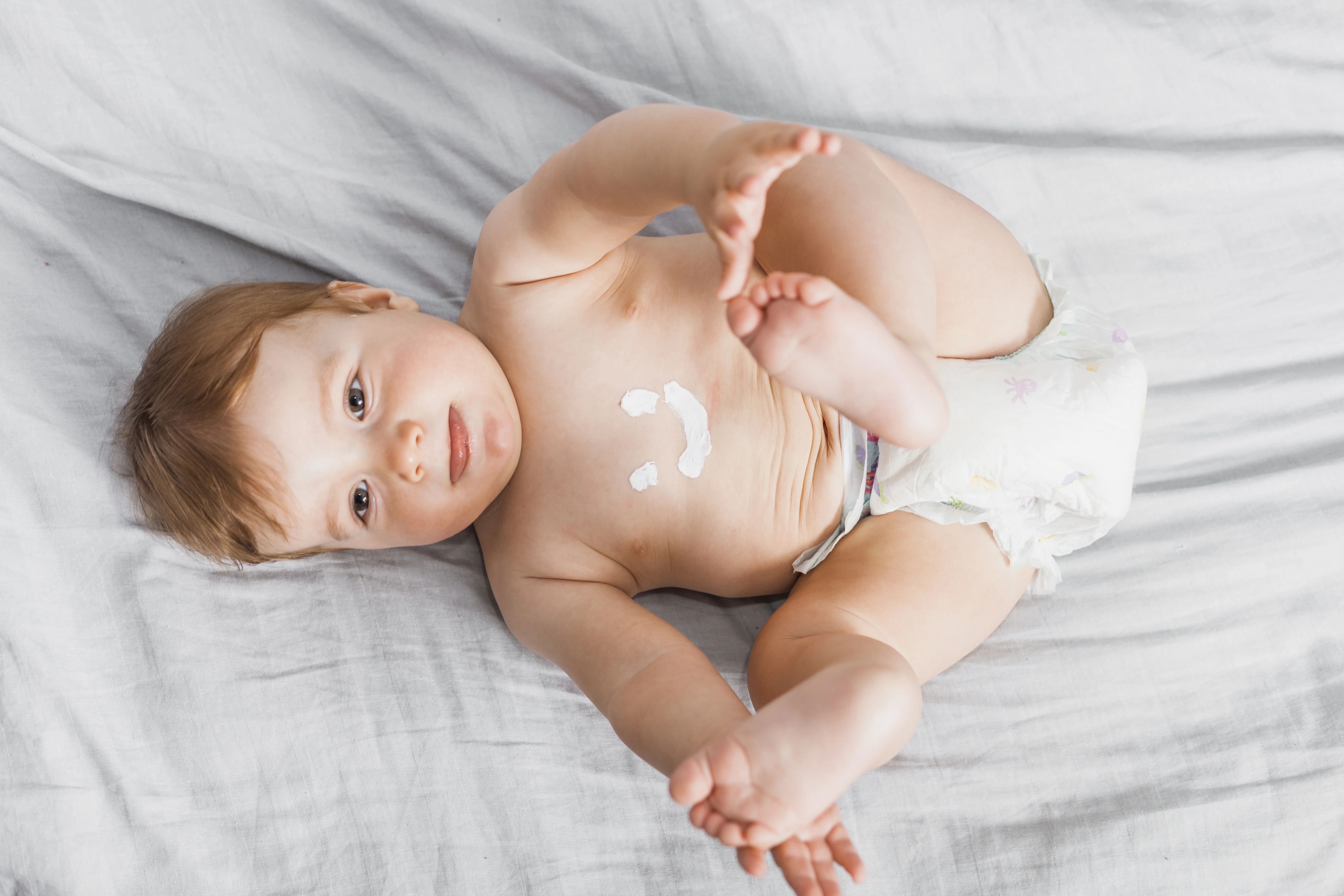 Top View Baby Spread With Lotion